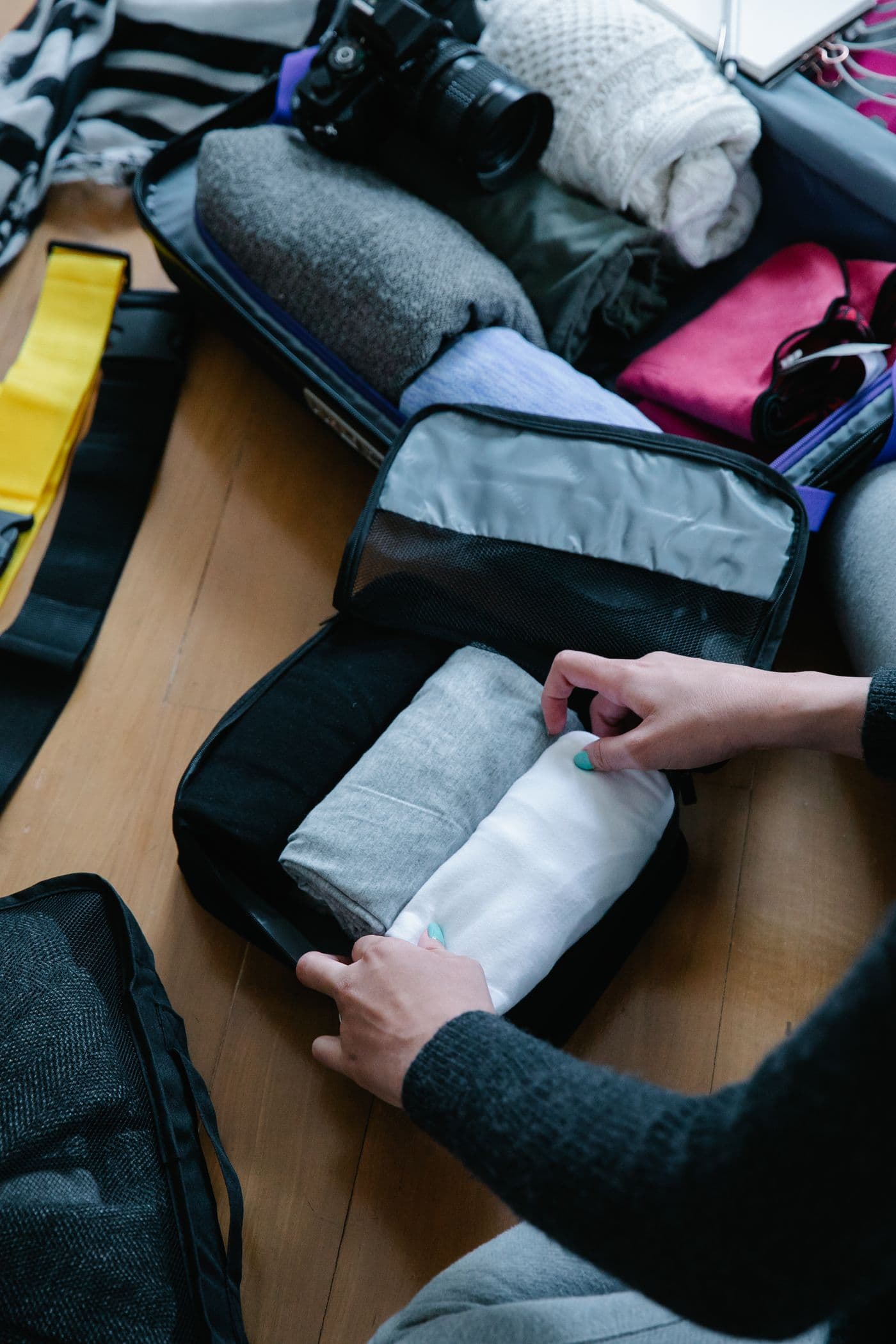 Traveler organizing a suitcase